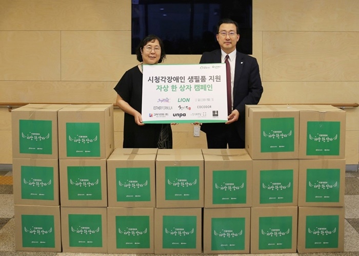 (왼쪽부터) 헬렌켈러센터 홍유미 센터장, 밀알나눔재단 오세욱 CSV추진본부장.jpg