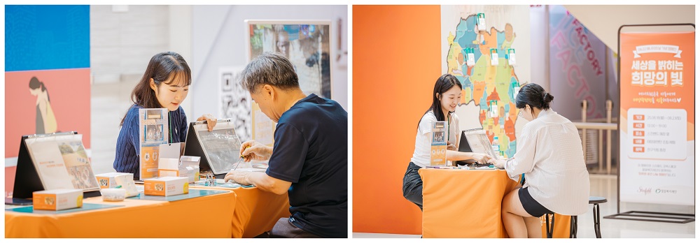 시민들이 직접 태양광랜턴을 조립하는 모습.jpg